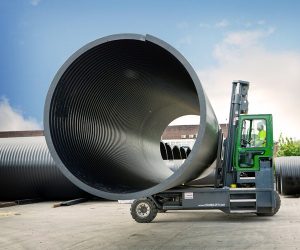 Combilift C25000 moving a large pipe