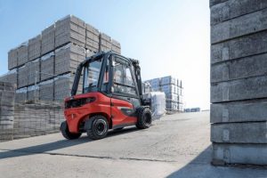 forklift carrying building material 